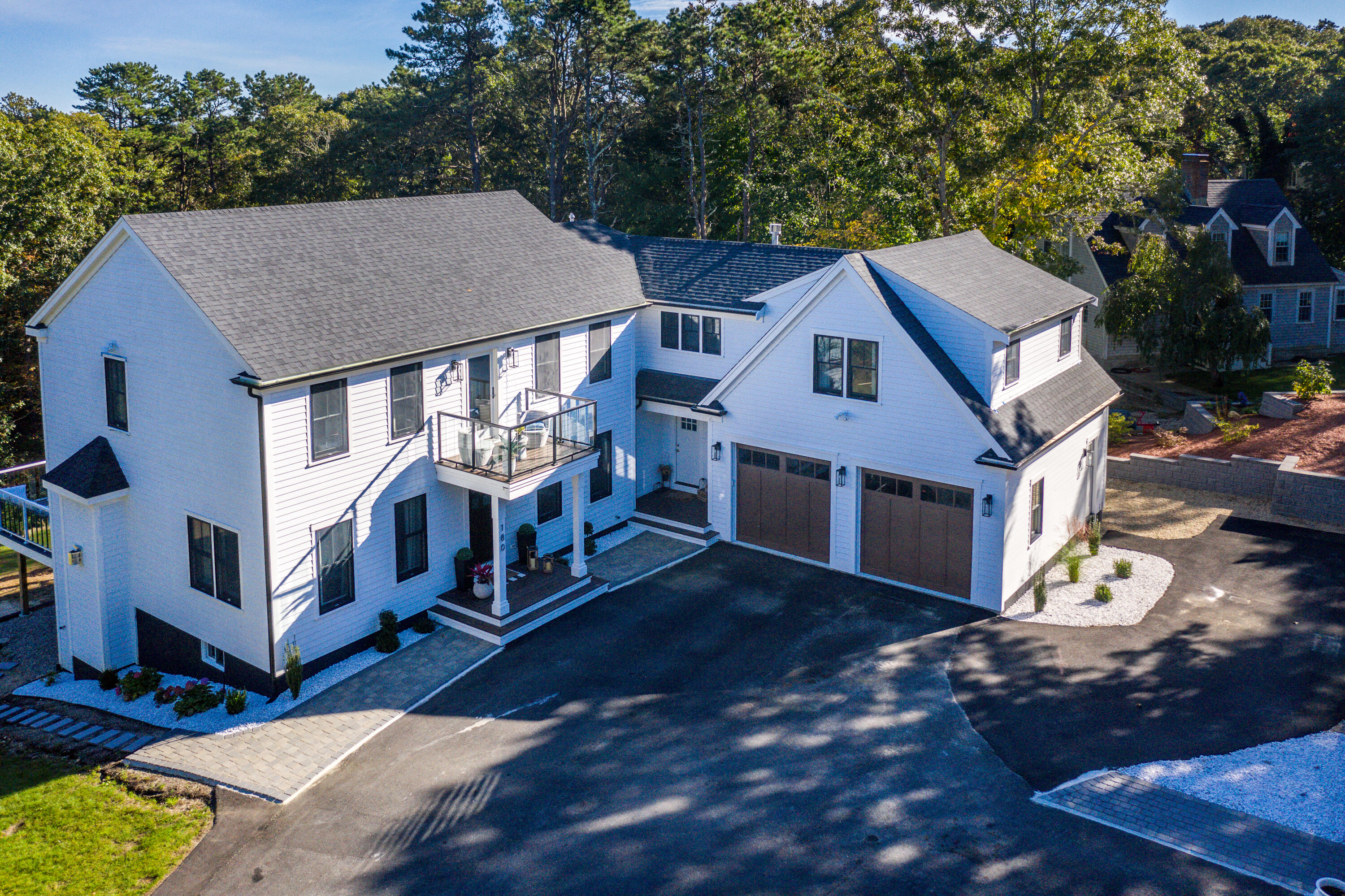 180 Kettle Hole Road West Barnstable, MA 02668 - Photo 2 of 53 a aerial view of a house next to a big yard