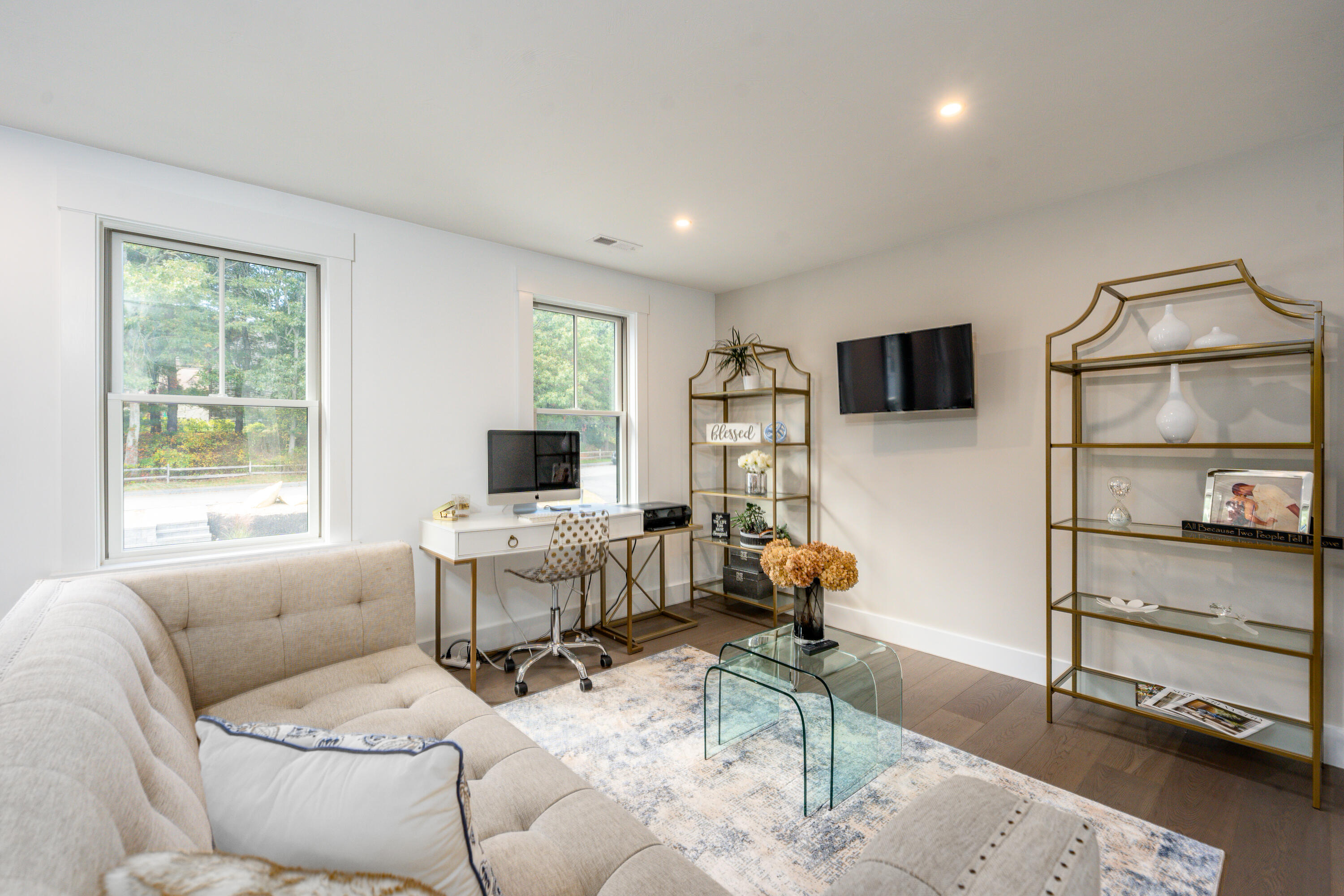 180 Kettle Hole Road West Barnstable, MA 02668 - Photo 26 of 53 a living room with furniture a flat screen tv and a window