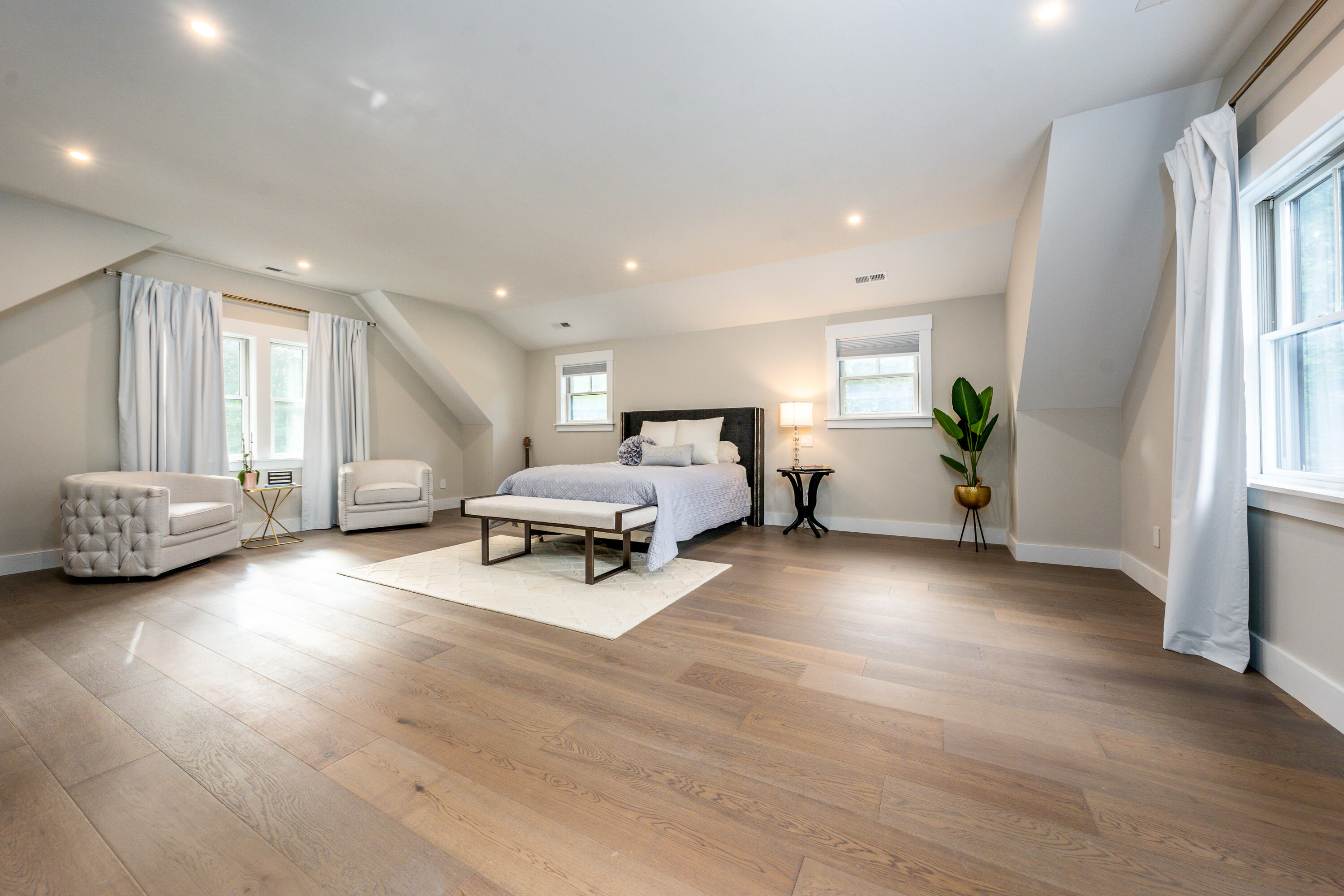 180 Kettle Hole Road West Barnstable, MA 02668 - Photo 30 of 53 a spacious bedroom with furniture and a couch