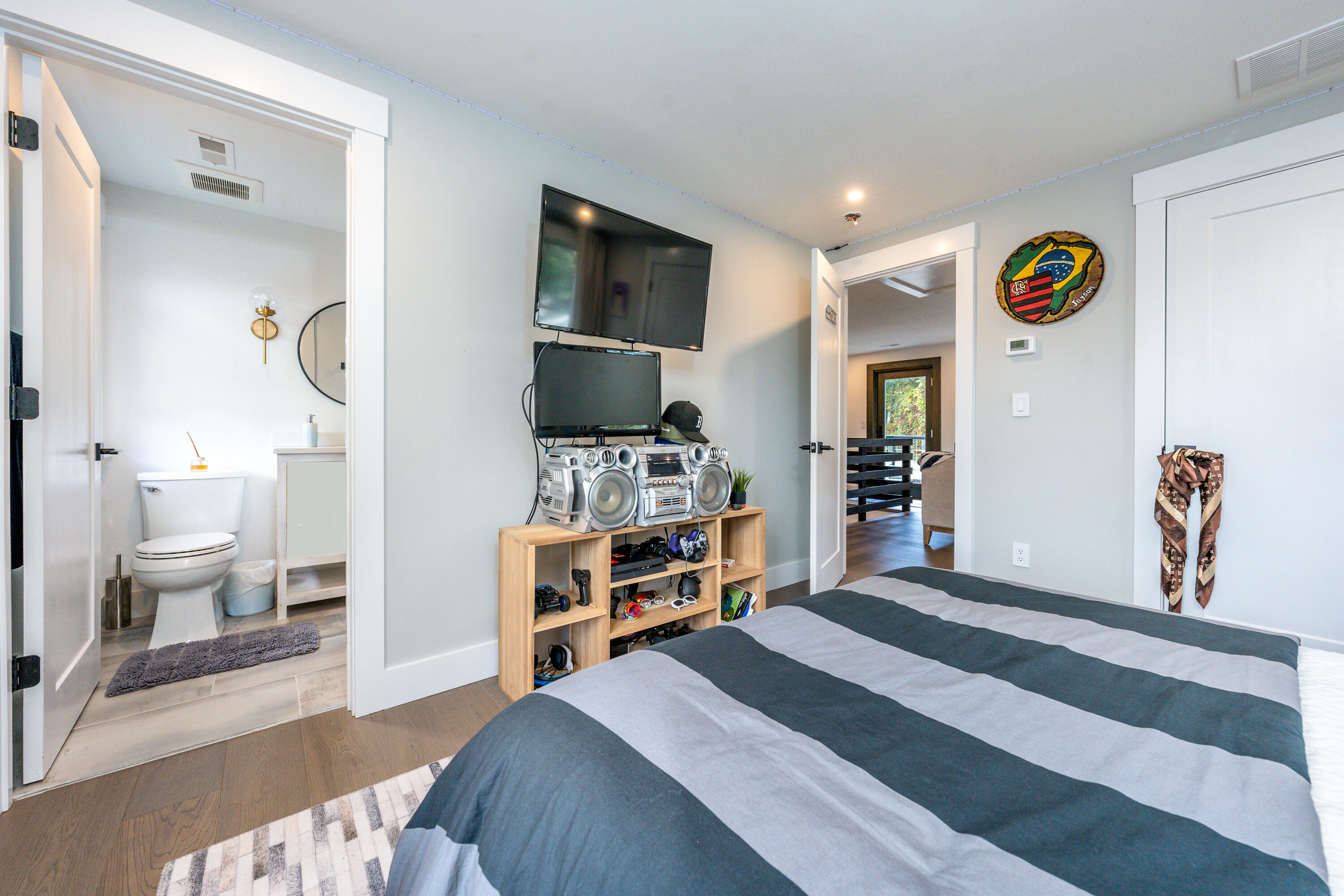 180 Kettle Hole Road West Barnstable, MA 02668 - Photo 38 of 53 a bedroom with furniture and a flat screen tv