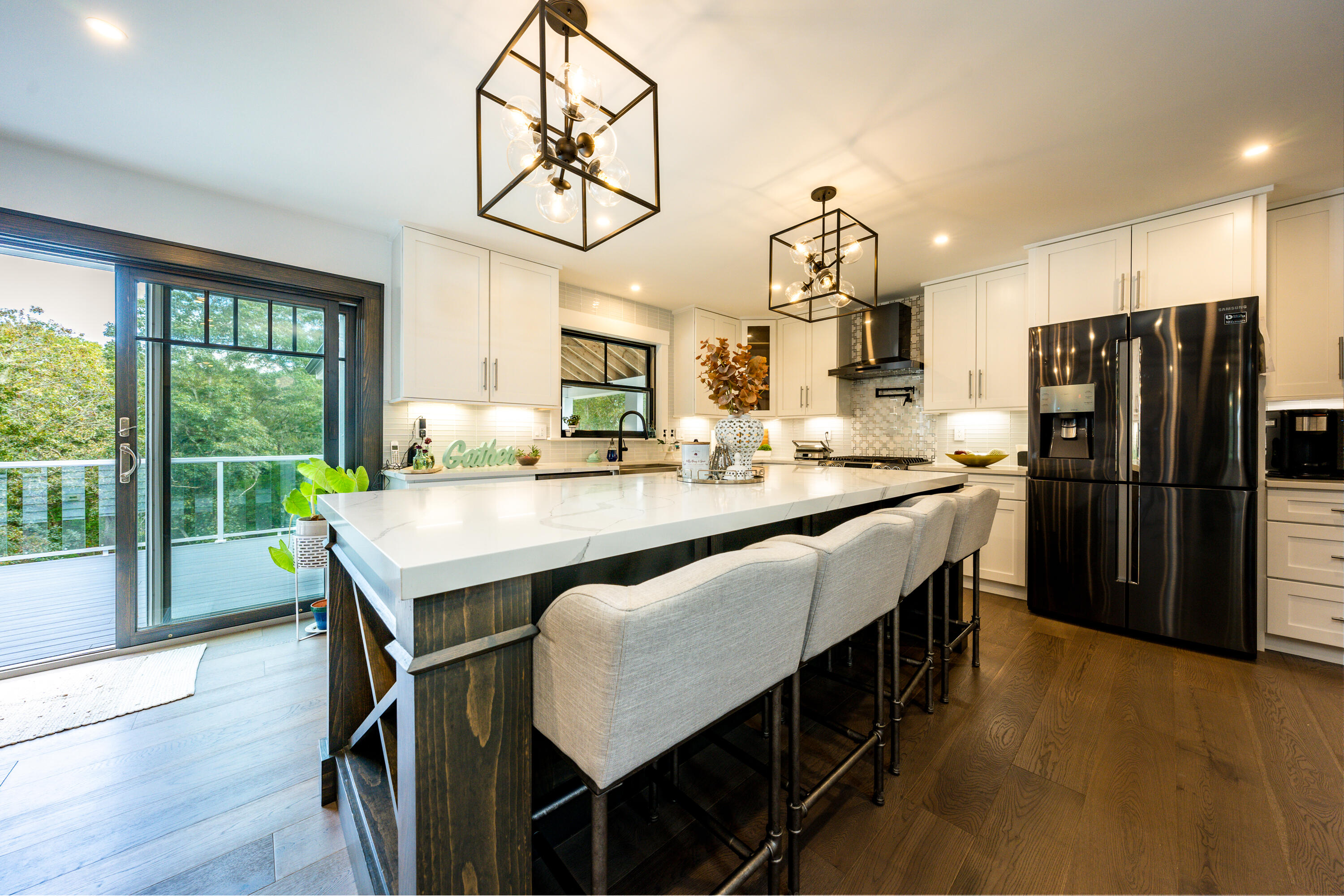 180 Kettle Hole Road West Barnstable, MA 02668 - Photo 4 of 53 a kitchen with kitchen island a large counter appliances and cabinets
