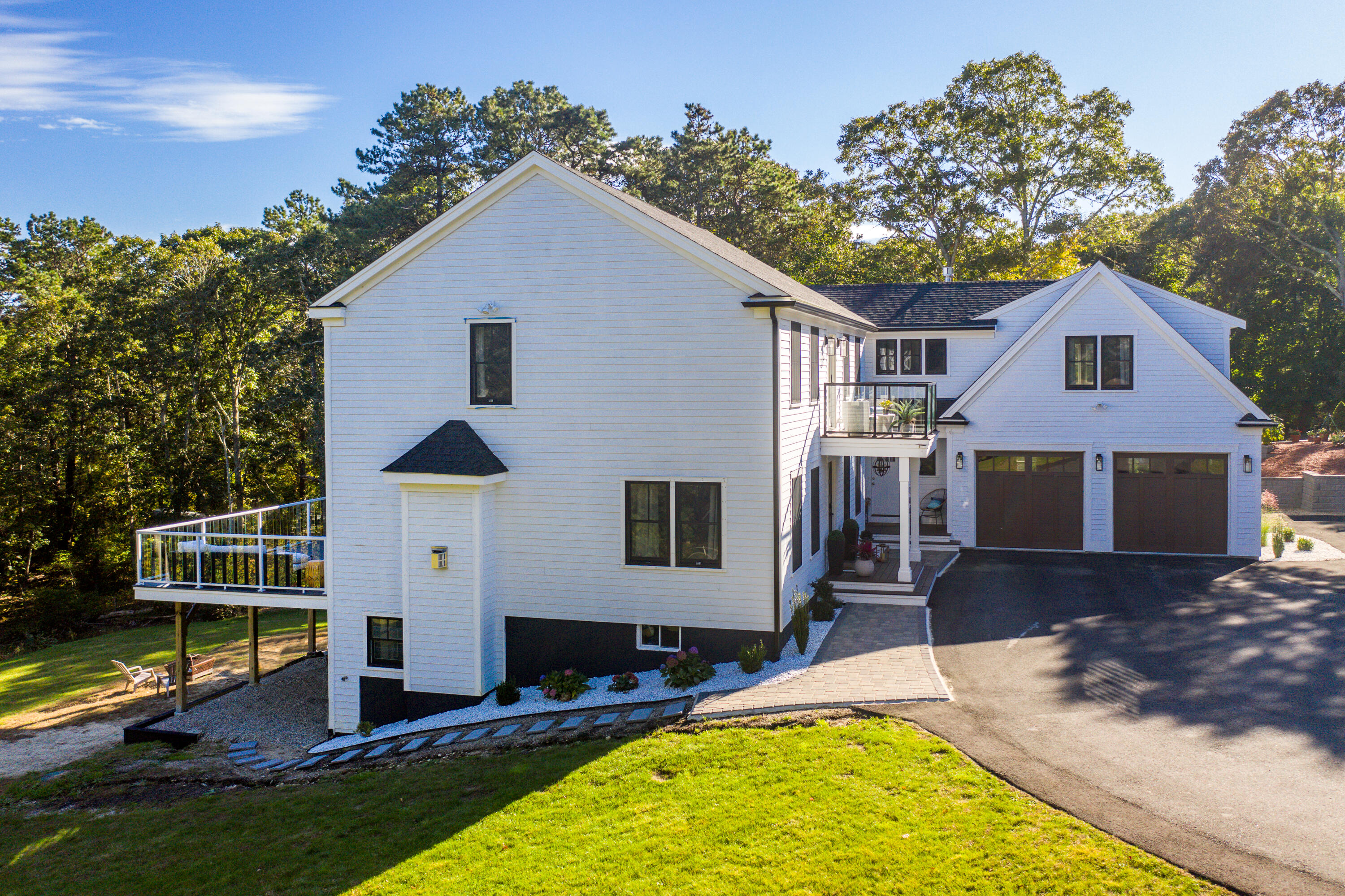 180 Kettle Hole Road West Barnstable, MA 02668 - Photo 44 of 53 a front view of a house with garden