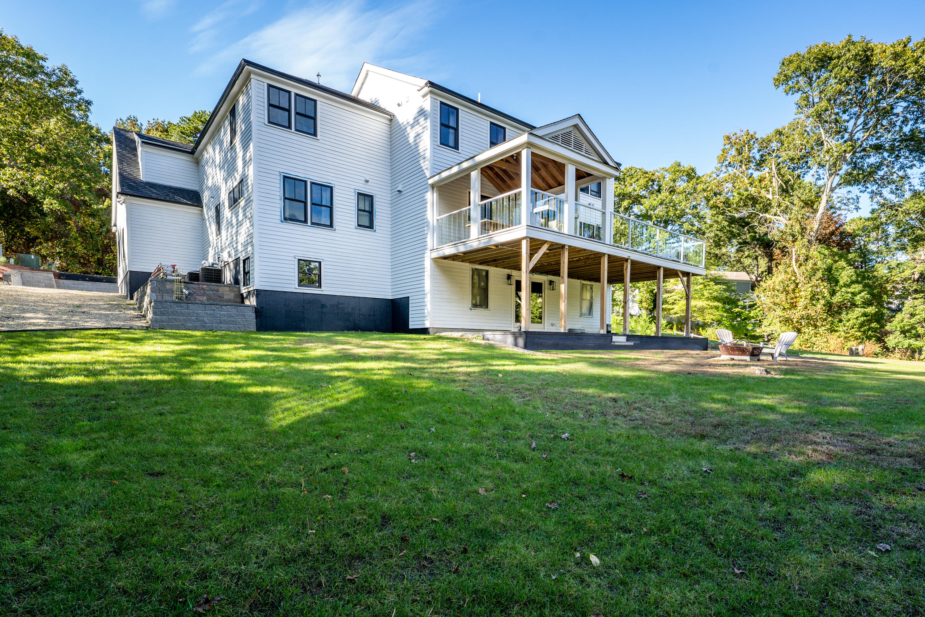 180 Kettle Hole Road West Barnstable, MA 02668 - Photo 47 of 53 a view of a house with a big yard and large trees