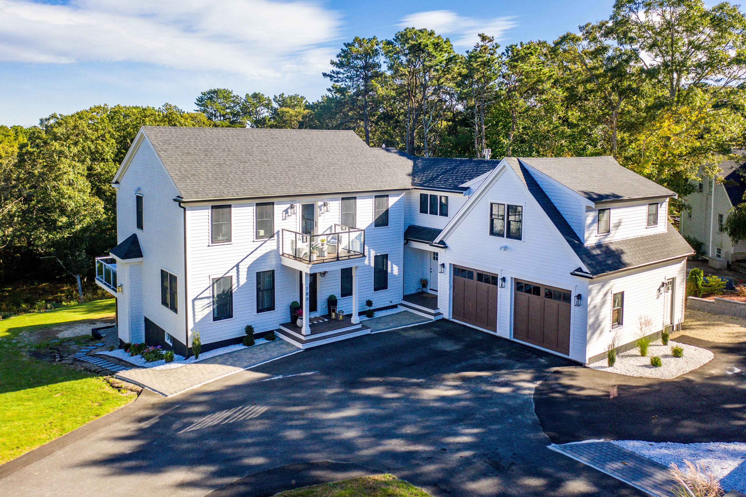 180 Kettle Hole Road West Barnstable, MA 02668 - Photo 50 of 53 a front view of a house with a yard