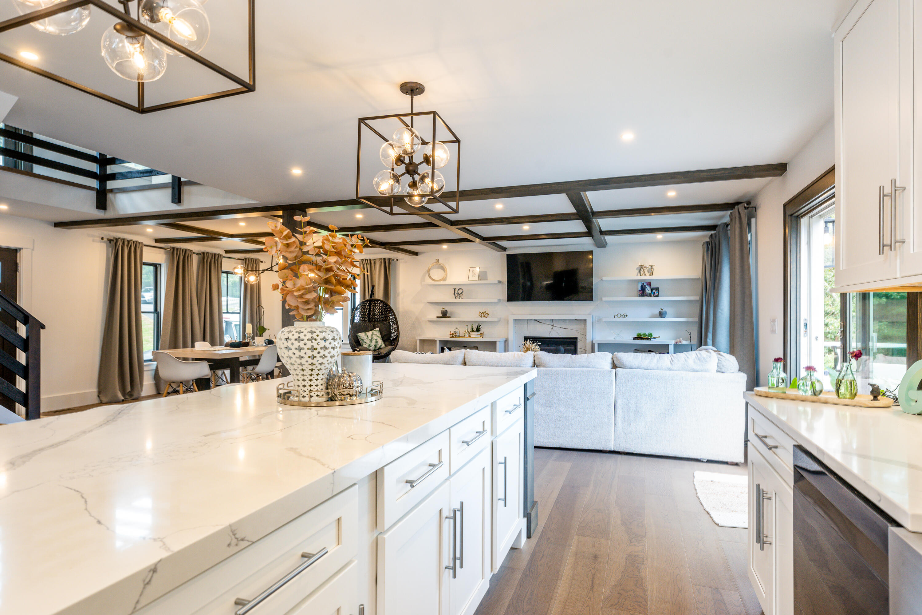 180 Kettle Hole Road West Barnstable, MA 02668 - Photo 9 of 53 a kitchen with a sink stainless steel appliances and white cabinets