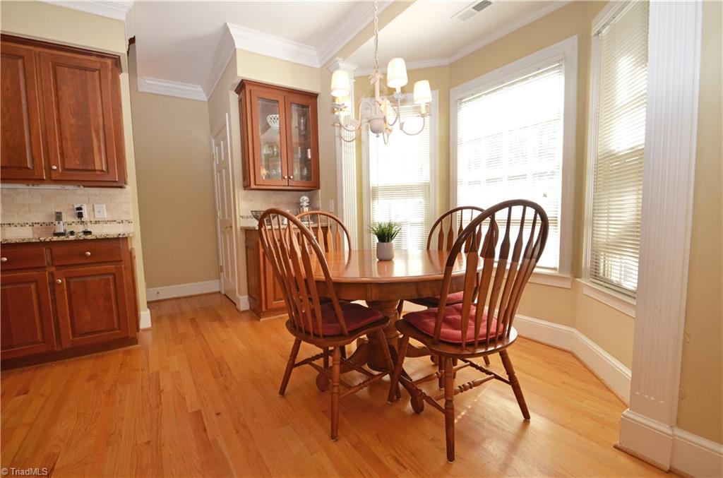 2833 Silas Ridge Road Winston-Salem, NC 27106 - Photo 14 of 30 Sunny breakfast nook leads to bonus room stairs.