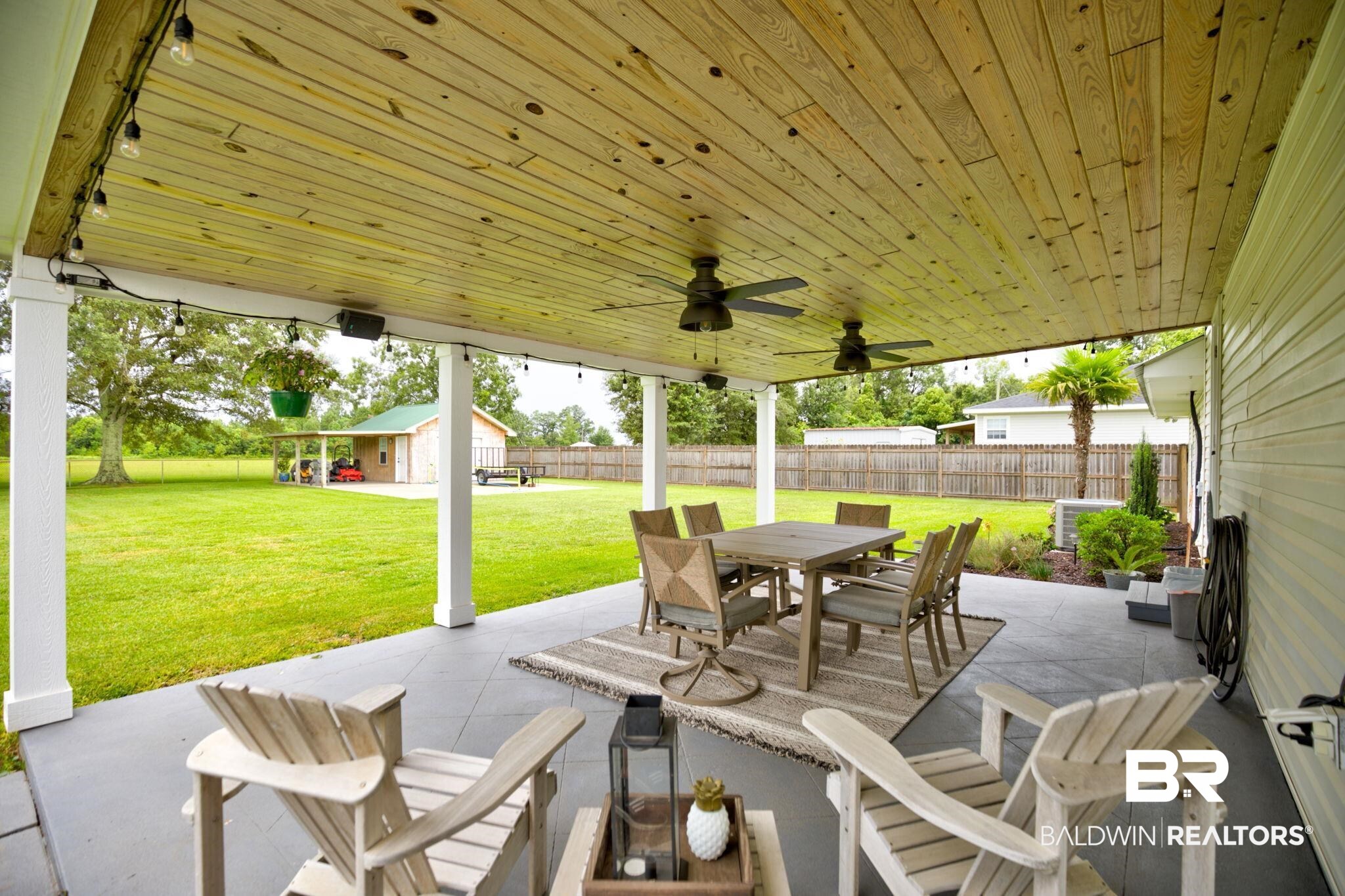 18732 Fairground Road Robertsdale, AL 36567 - Photo 39 of 46 View of patio featuring an outbuilding and ceiling fan