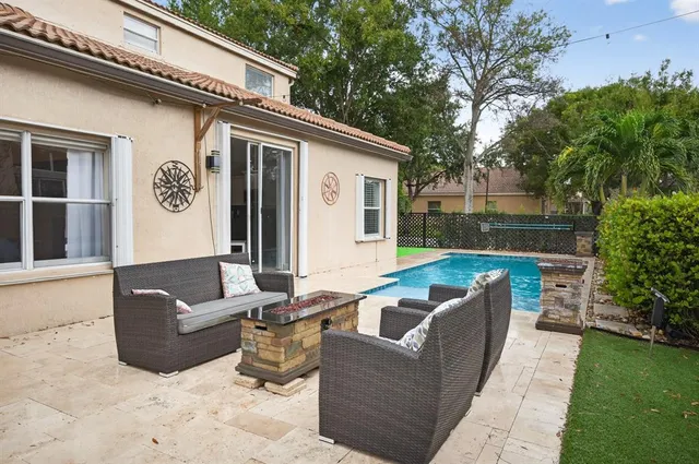 a view of a couches in patio of house
