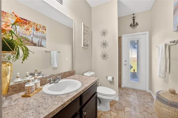 a bedroom with a bed and dresser