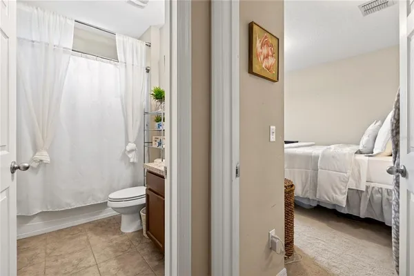 a view of a swimming pool with an outdoor seating