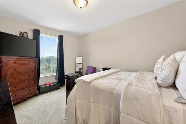 a aerial view of a house with a swimming pool