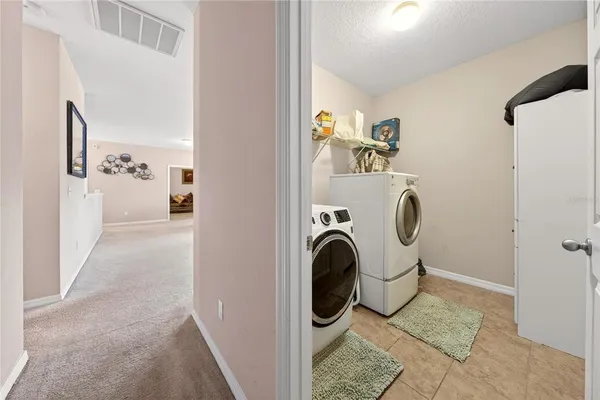 an aerial view of residential building and lake