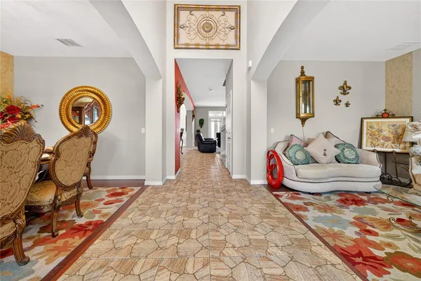 a kitchen with granite countertop a stove a sink and a cabinets