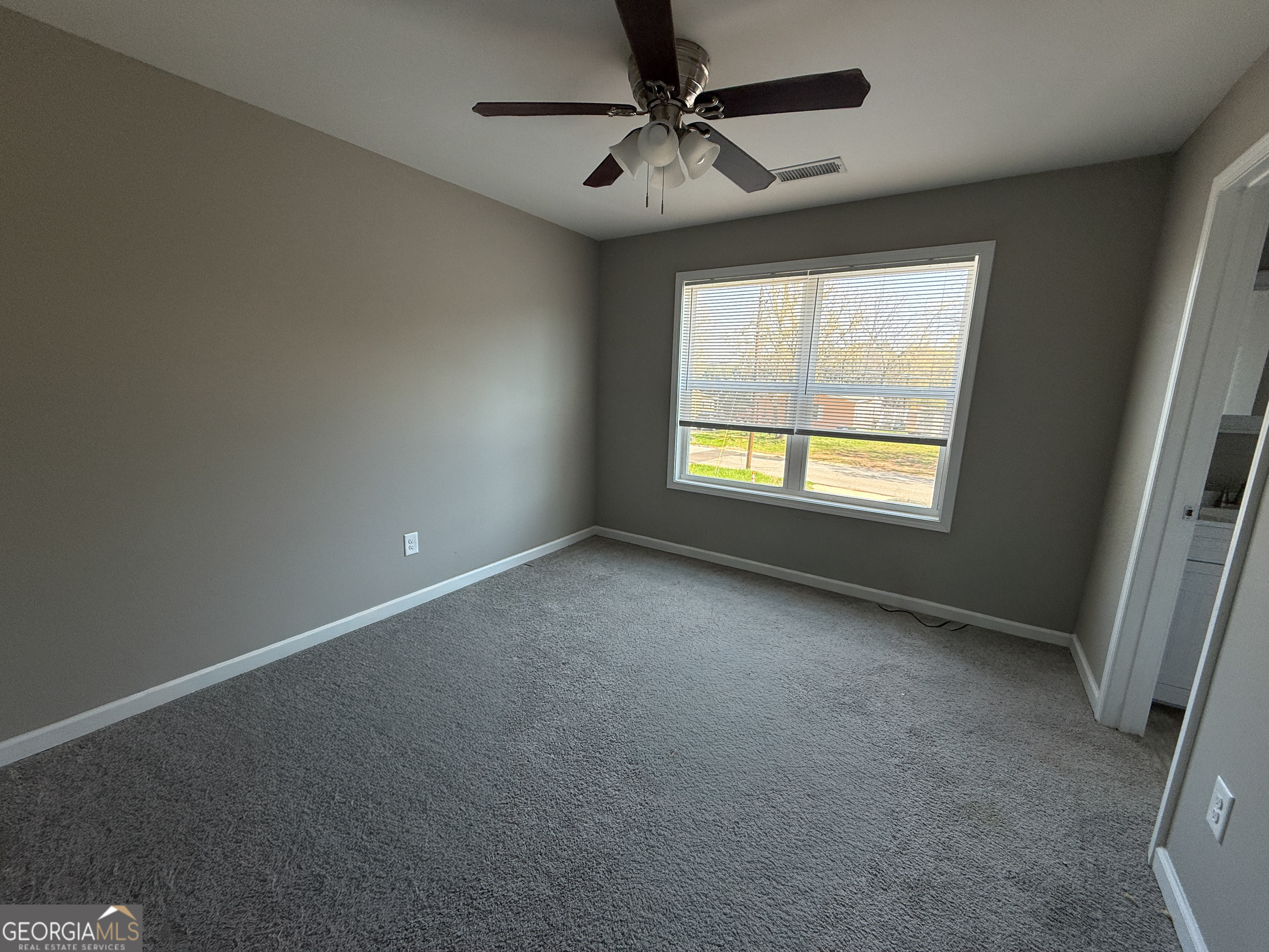 305 Martin Circle Athens, GA 30601 - Photo 11 of 15 a view of an empty room with a window