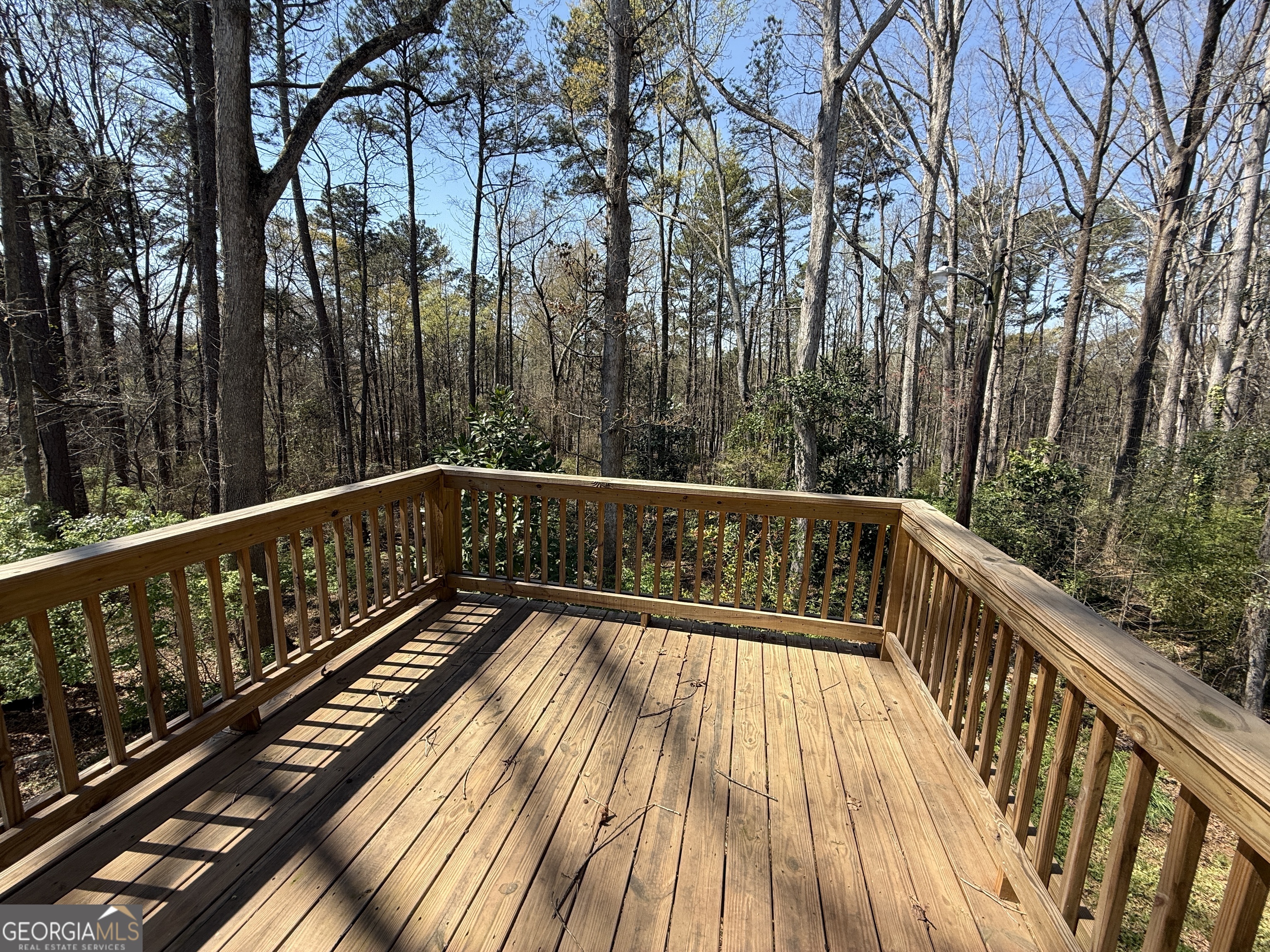 305 Martin Circle Athens, GA 30601 - Photo 15 of 15 a view of balcony with wooden floor and fence