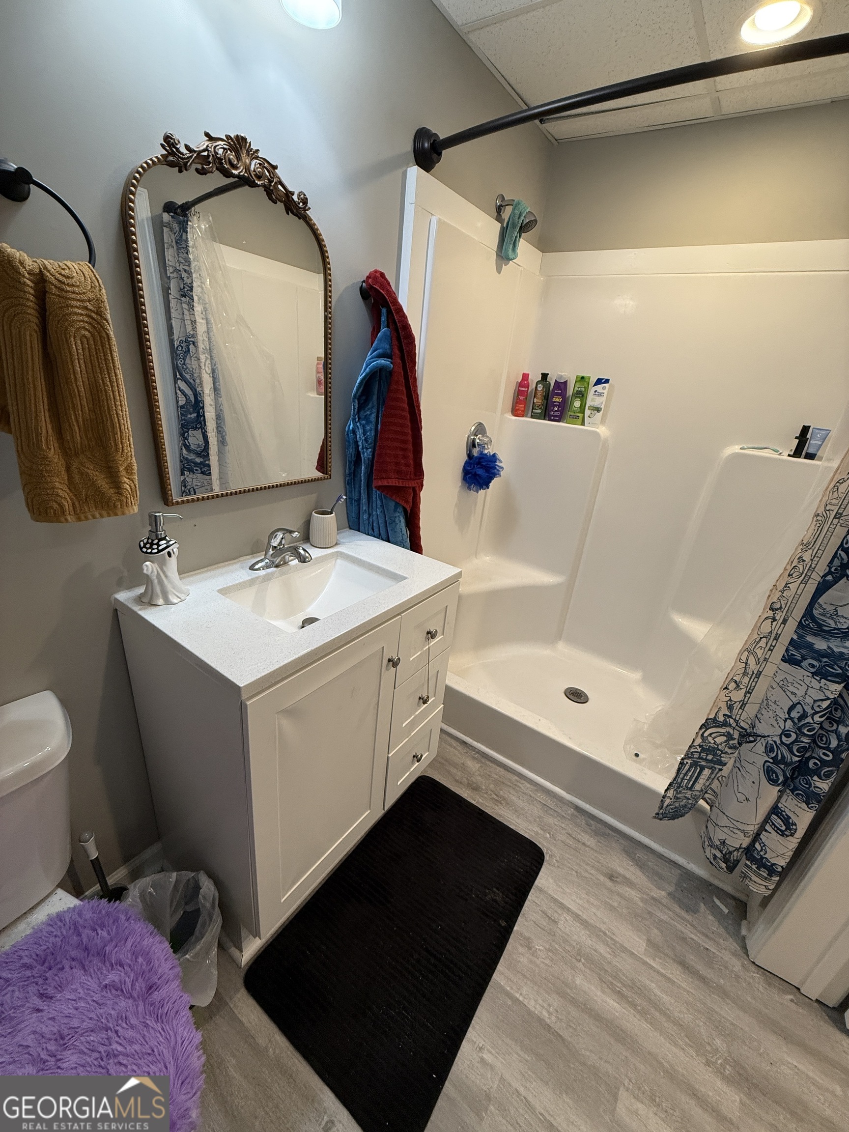 305 Martin Circle Athens, GA 30601 - Photo 8 of 15 a bathroom with a sink a toilet and a bathtub