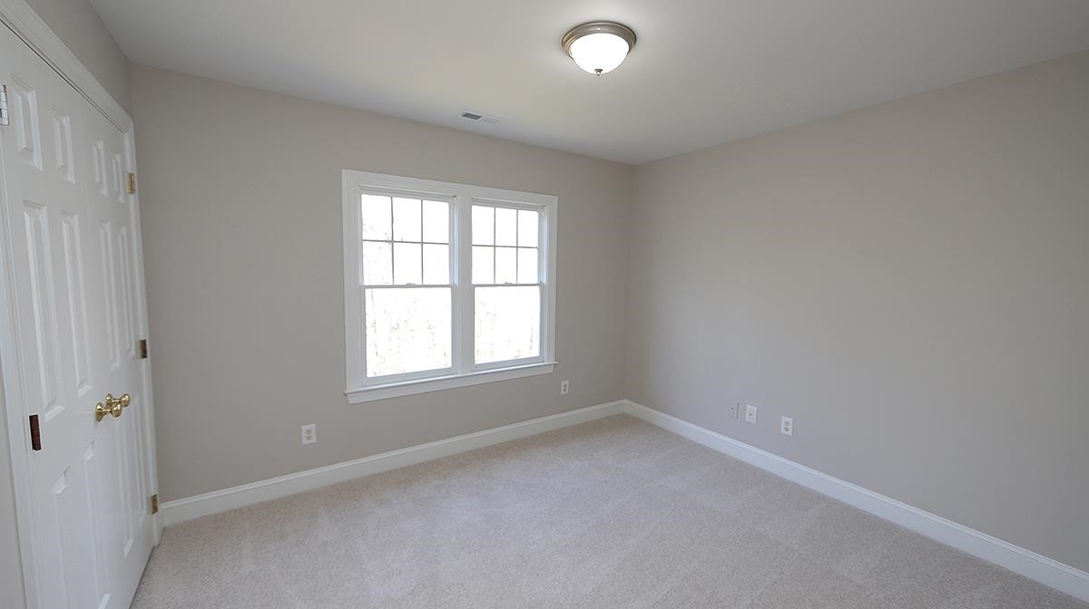 10401 Hallingdale Court Raleigh, NC 27614 - Photo 24 of 37 No Tiny Bedrooms Here! All are Good Sized Rooms with Closets that have Built in Shelving and/or Hanging Room. Bedroom 3