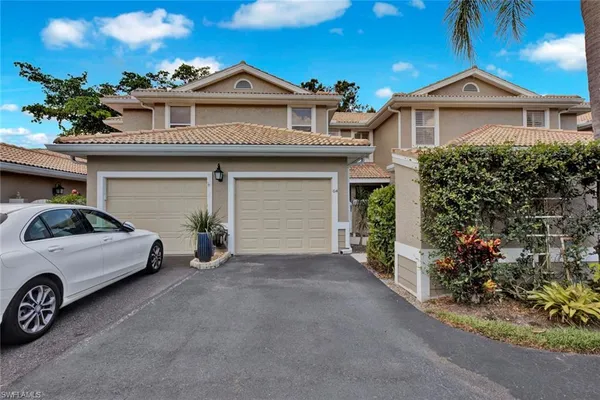 front view of a house with a street