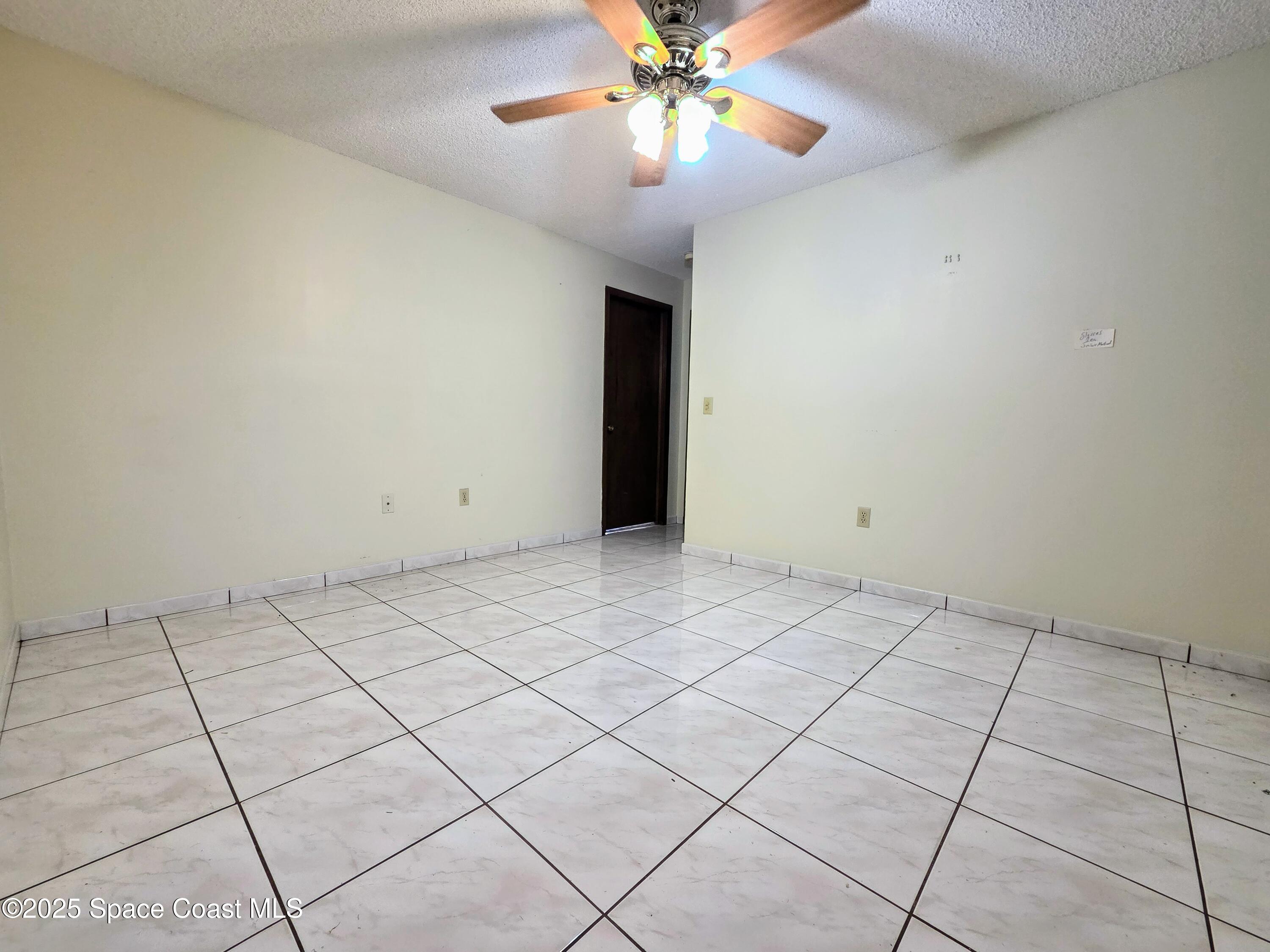 2591 Fulton Court Melbourne, FL 32935 - Photo 14 of 28 a view of an empty room