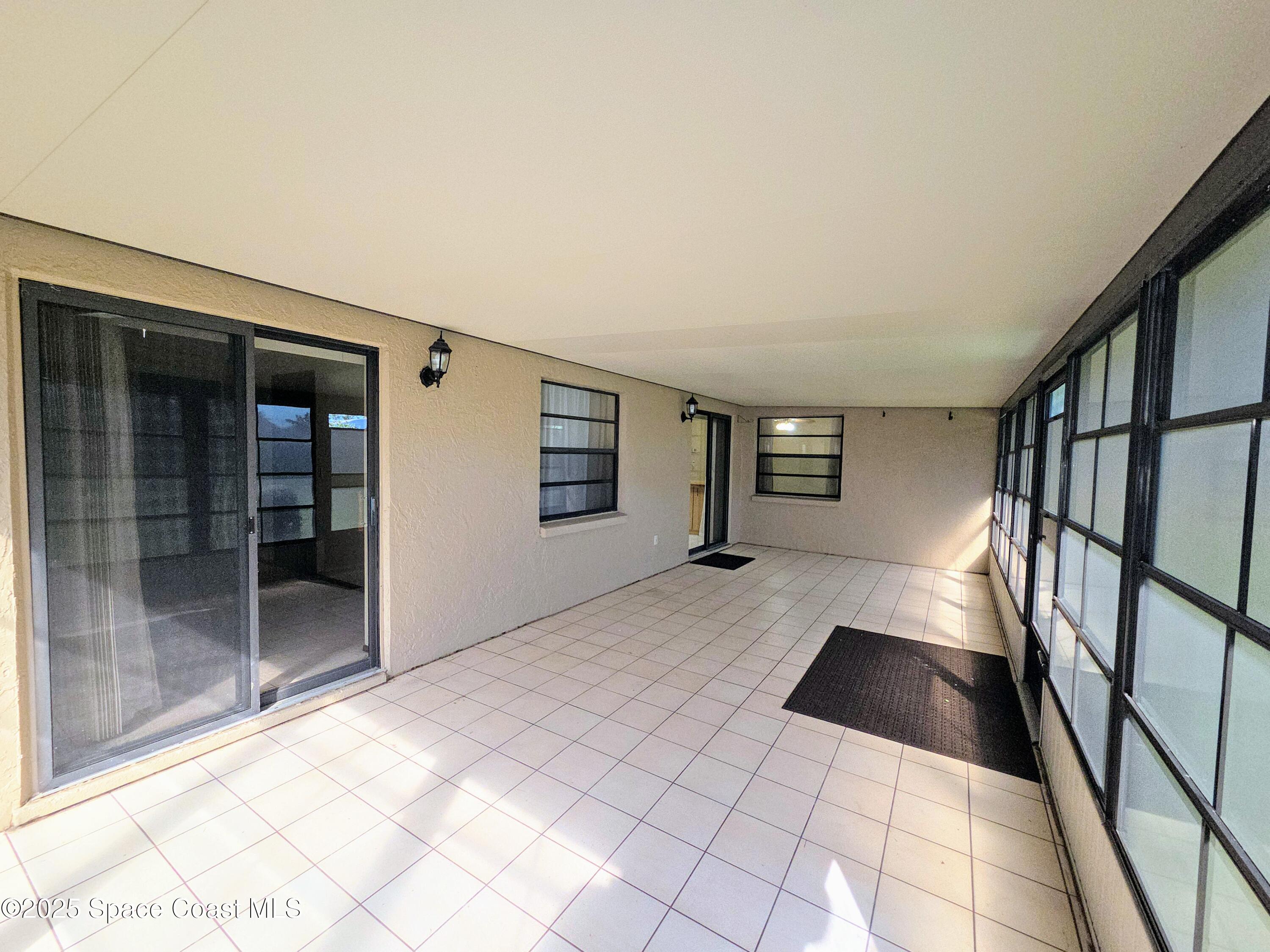 2591 Fulton Court Melbourne, FL 32935 - Photo 21 of 28 a view of an empty room and window