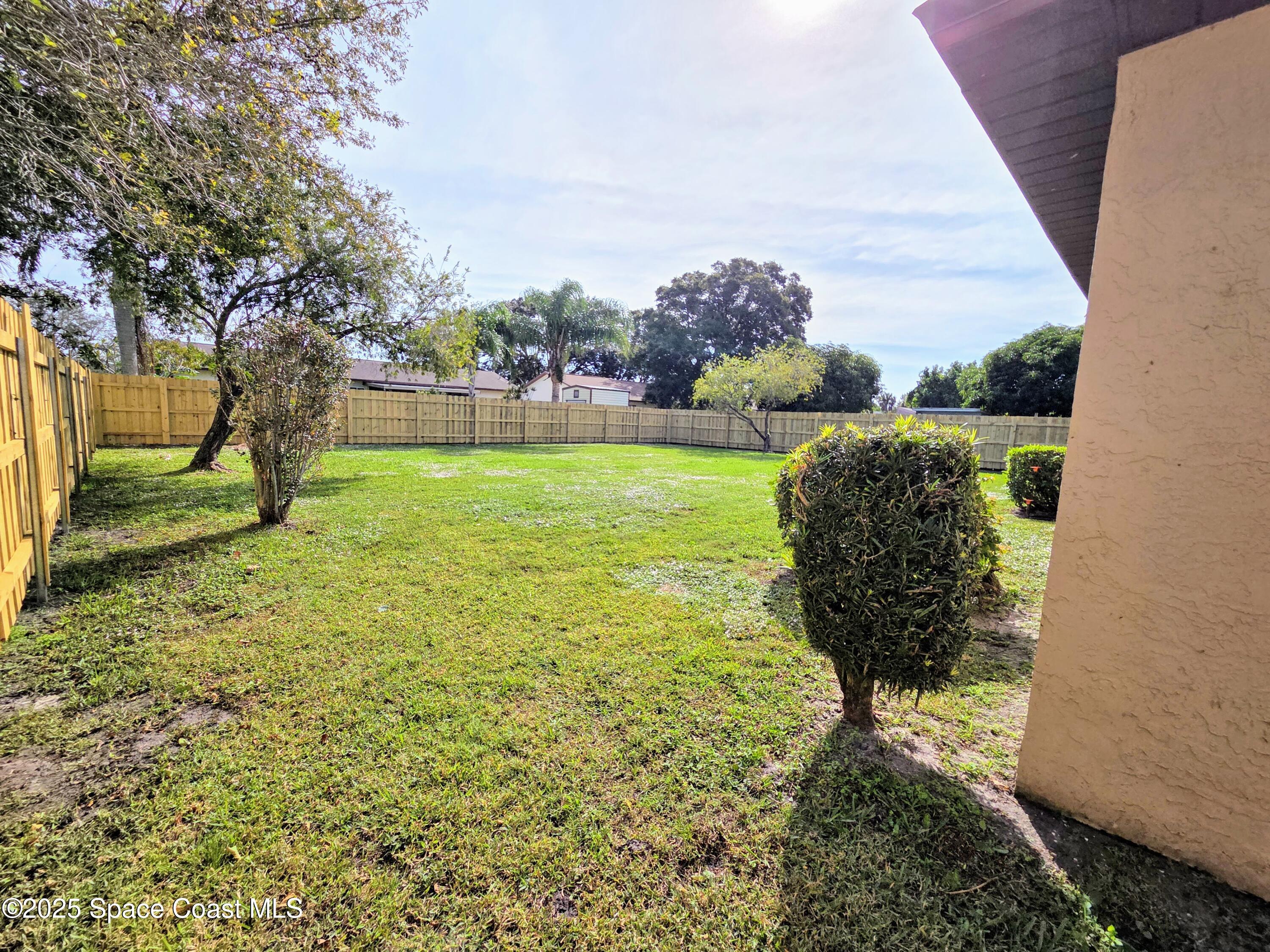 2591 Fulton Court Melbourne, FL 32935 - Photo 27 of 28 a view of a garden