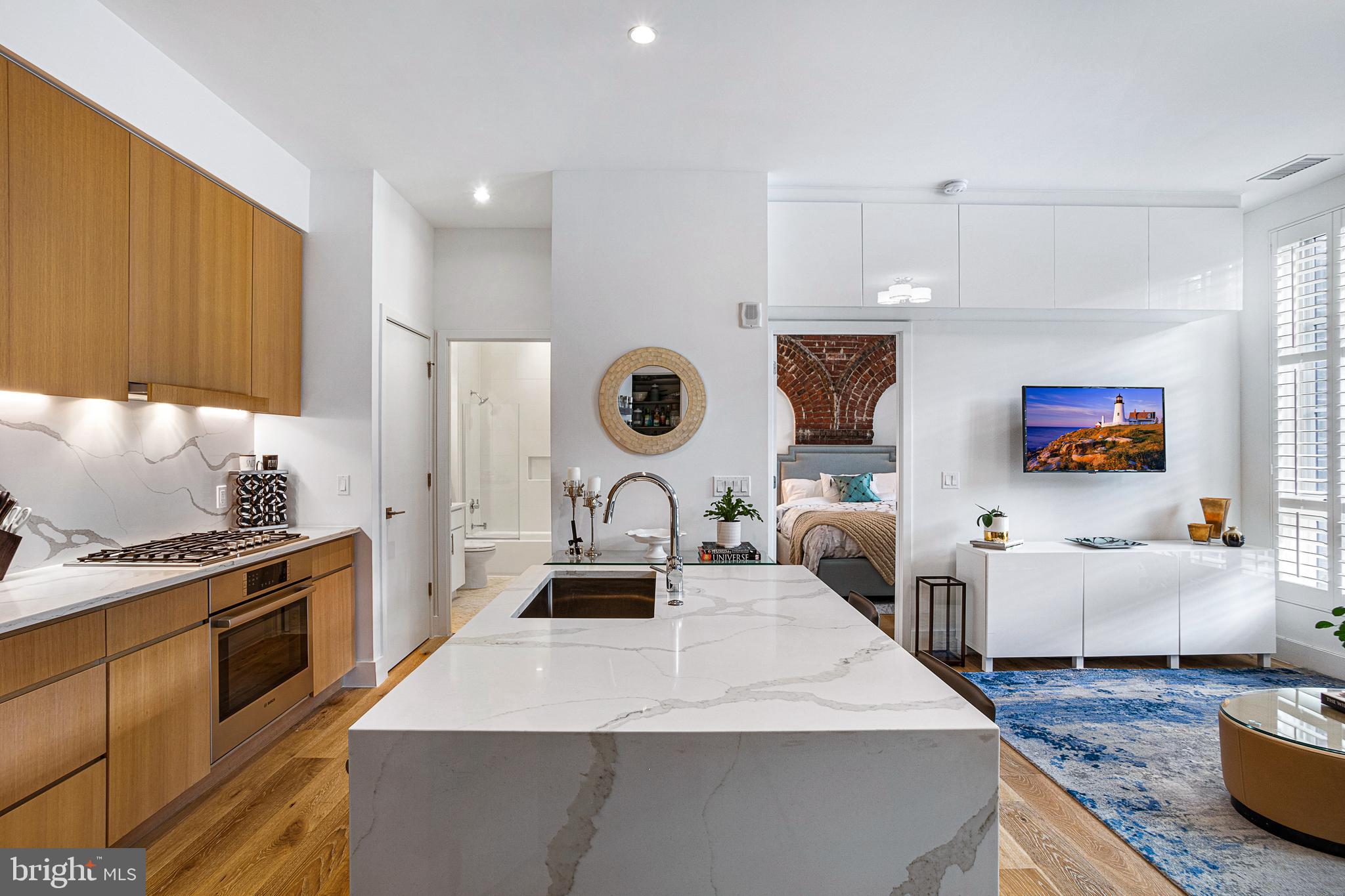 1324 E Street Southeast, Unit 208 Washington, DC 20003 - Photo 15 of 40 Waterfall Island - Calacatta Quartz Counters