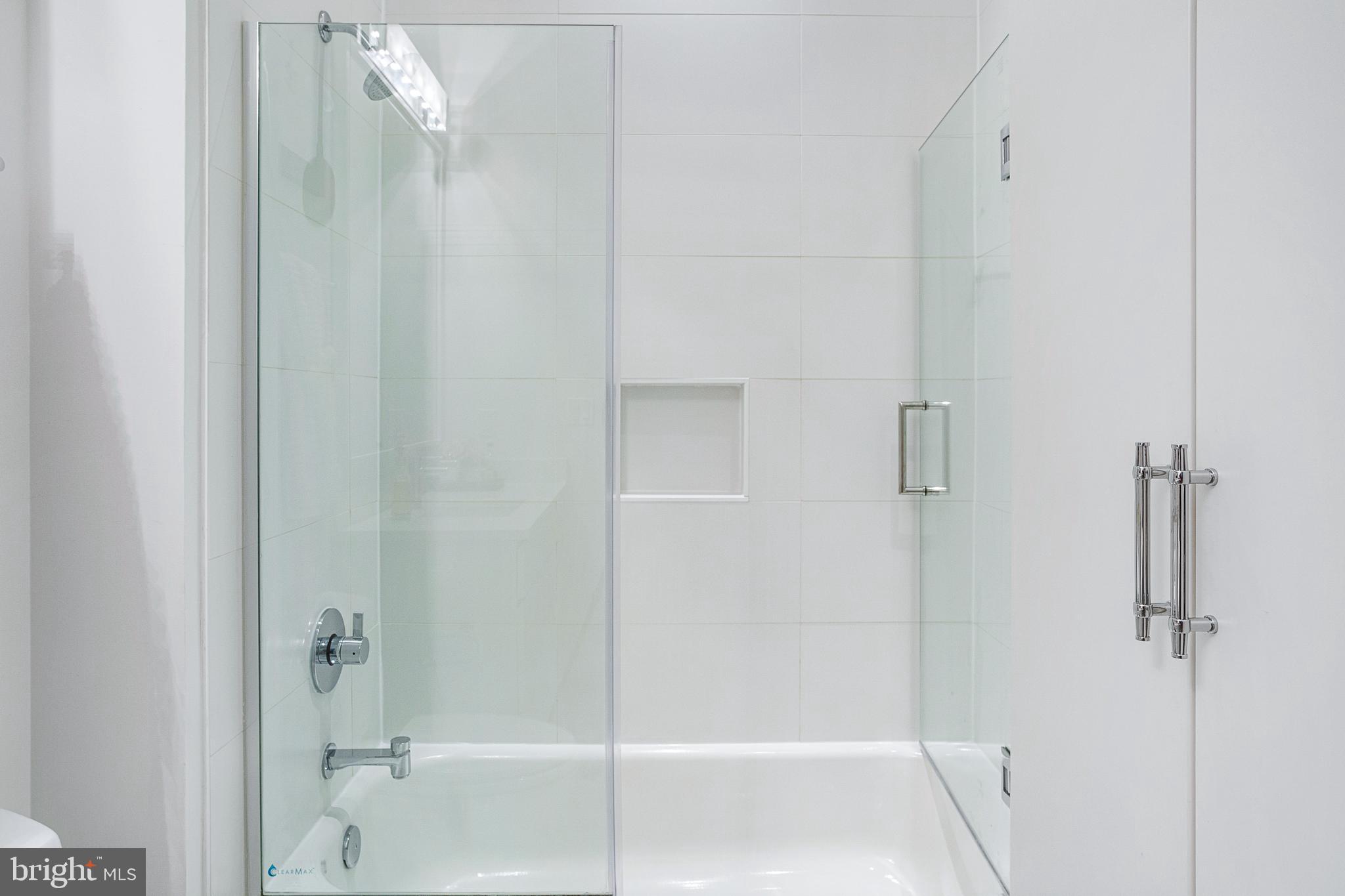 1324 E Street Southeast, Unit 208 Washington, DC 20003 - Photo 25 of 40 Glass Enclosed Tub/Shower