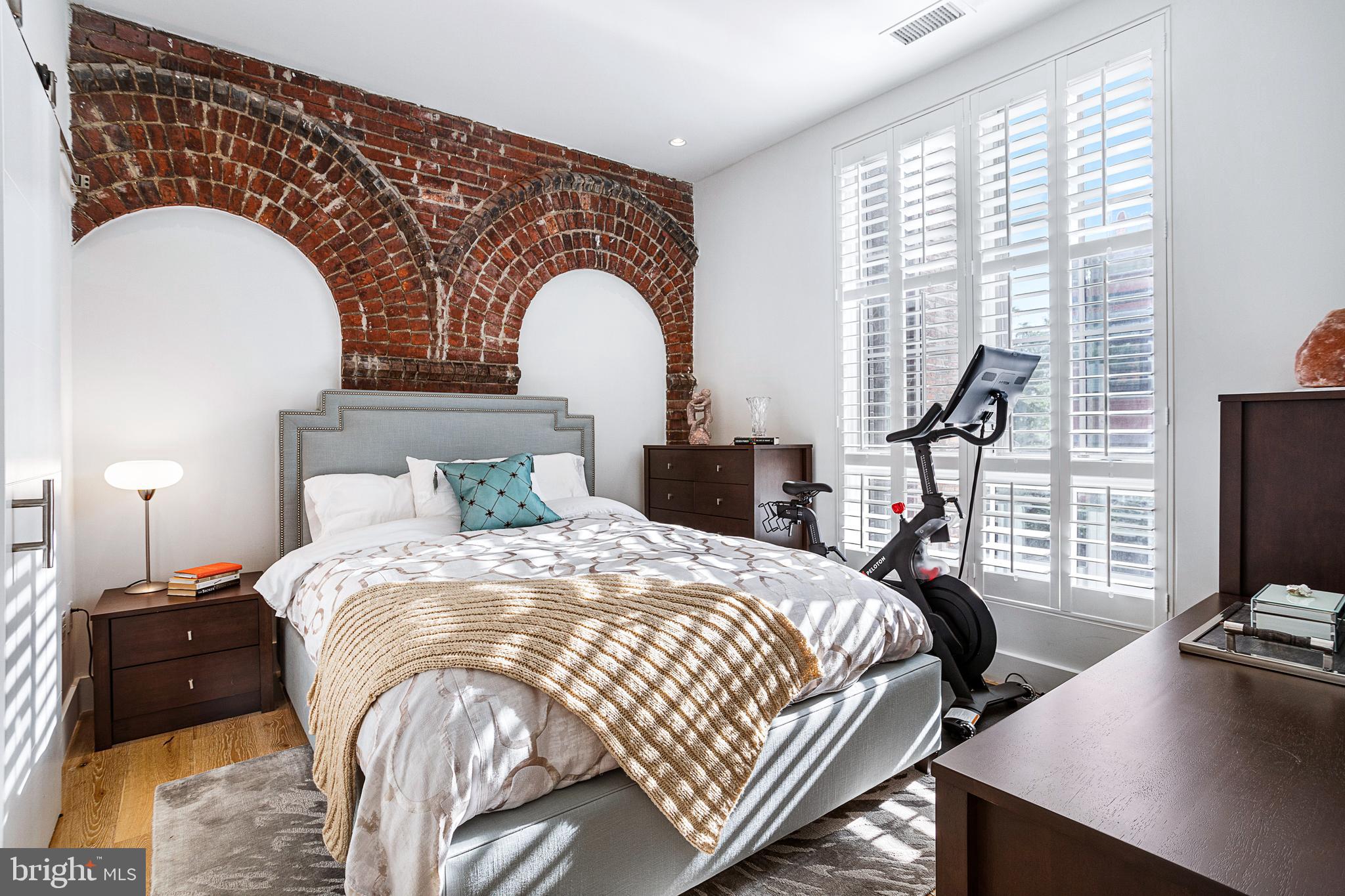 1324 E Street Southeast, Unit 208 Washington, DC 20003 - Photo 26 of 40 Exposed Brick in Bedroom
