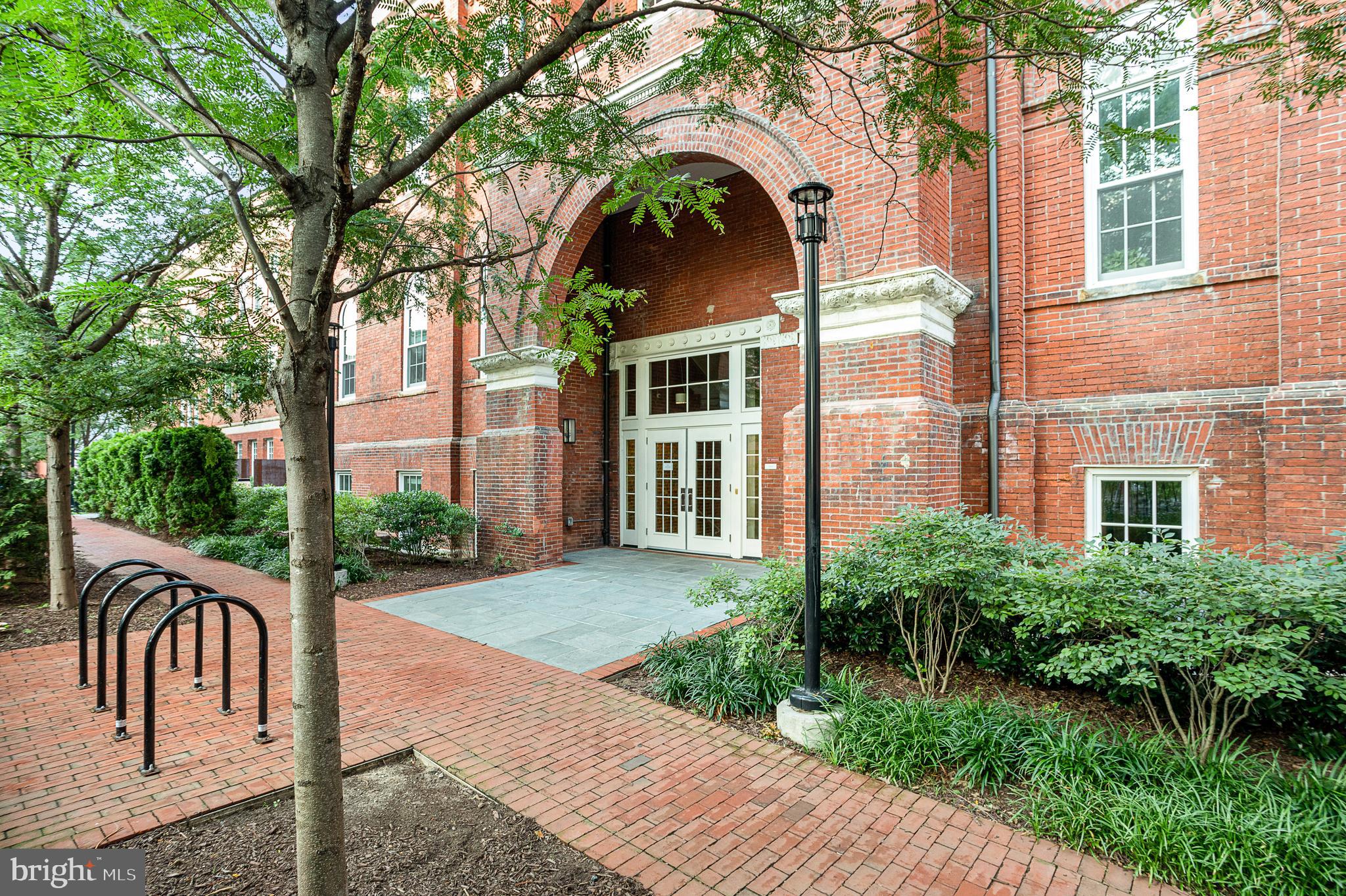 1324 E Street Southeast, Unit 208 Washington, DC 20003 - Photo 4 of 40 Archway Entrance Across from Bike Racks.
