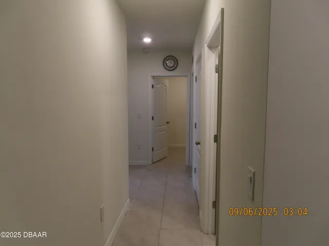 a view of a patio with swimming pool table and chairs