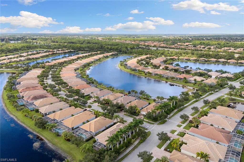 8407 Benelli Court Naples, FL 34114 - Photo 41 of 50 an aerial view of residential houses with outdoor space