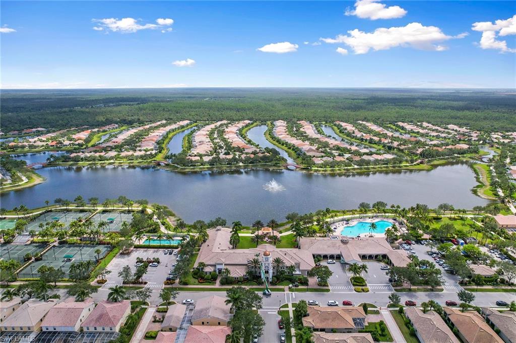 8407 Benelli Court Naples, FL 34114 - Photo 50 of 50 an aerial view of a city with an ocean