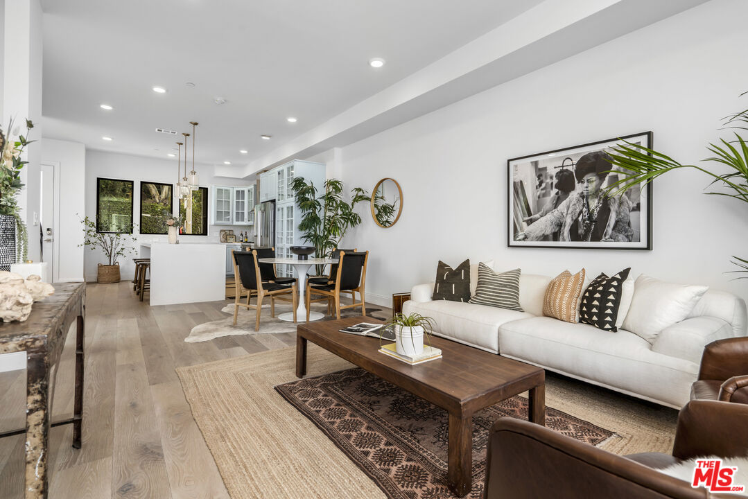 855 Merwin Street Los Angeles, CA 90026 - Photo 2 of 12 a living room with furniture and wooden floor