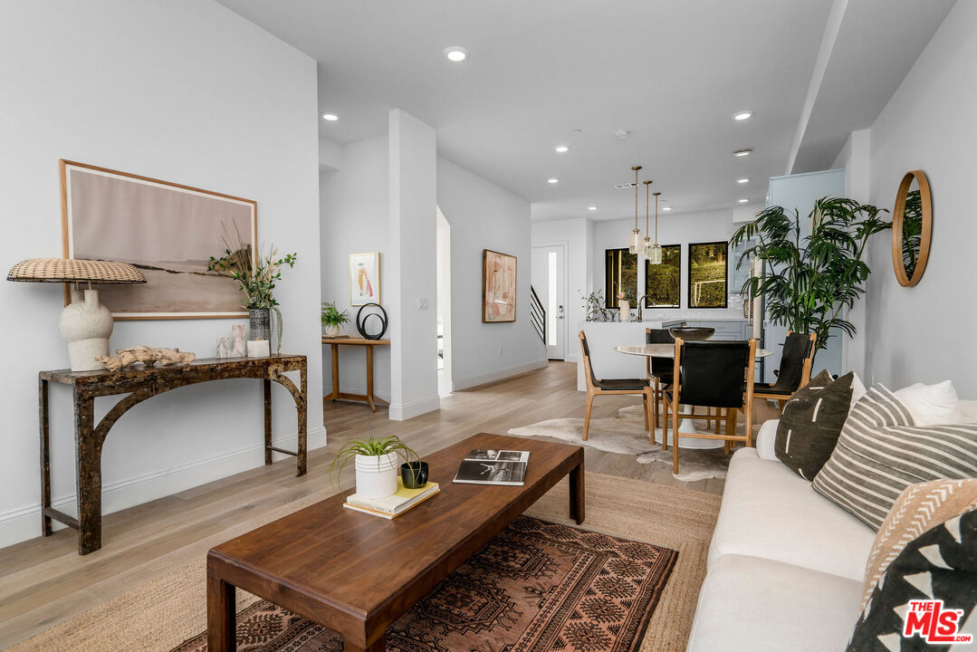 855 Merwin Street Los Angeles, CA 90026 - Photo 4 of 12 a living room with furniture and a couch
