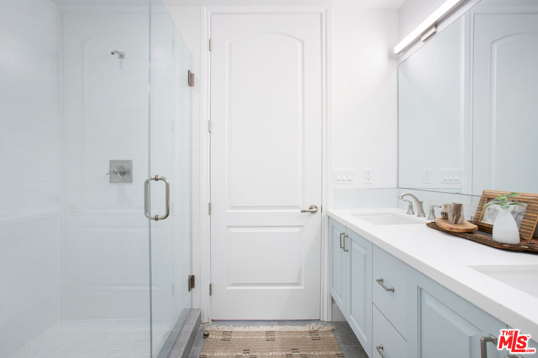 855 Merwin Street Los Angeles, CA 90026 - Photo 6 of 12 a bathroom with a sink and mirror