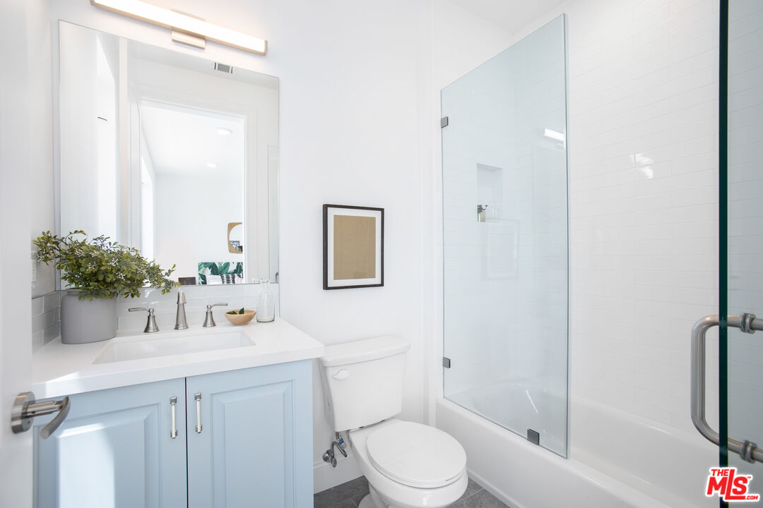 855 Merwin Street Los Angeles, CA 90026 - Photo 8 of 12 a bathroom with a sink toilet and shower