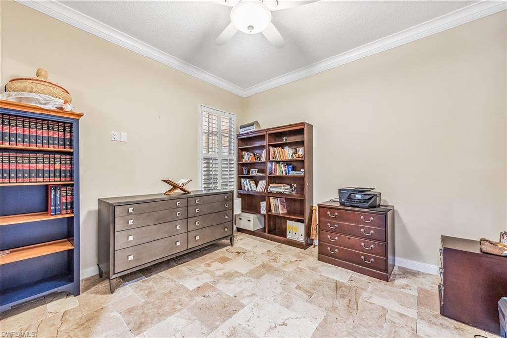 2881 Hatteras Way Naples, FL 34119 - Photo 20 of 32 a room with furniture and closet
