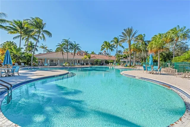 a view of a swimming pool with a patio