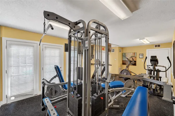 a view of a room with gym equipment
