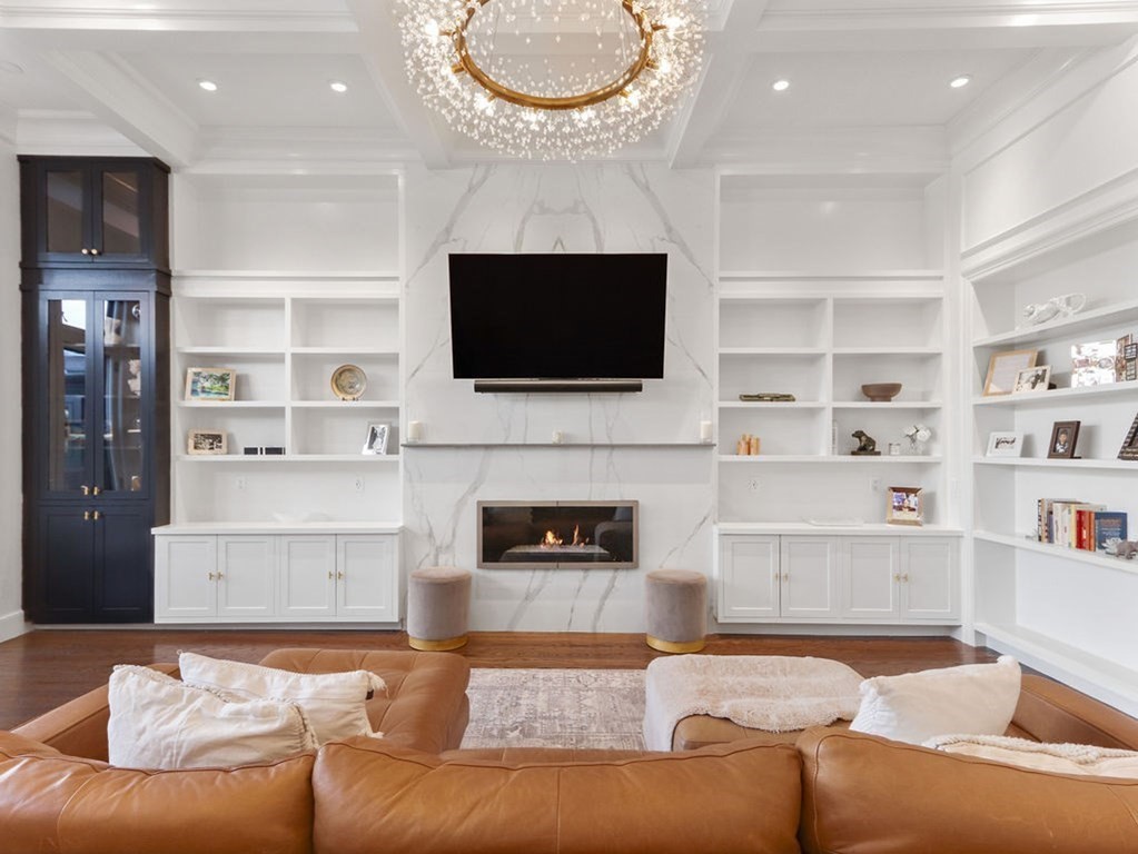 206 Beacon Street, Unit 1 Boston, MA 02116 - Photo 1 of 23 a living room with furniture and a fireplace