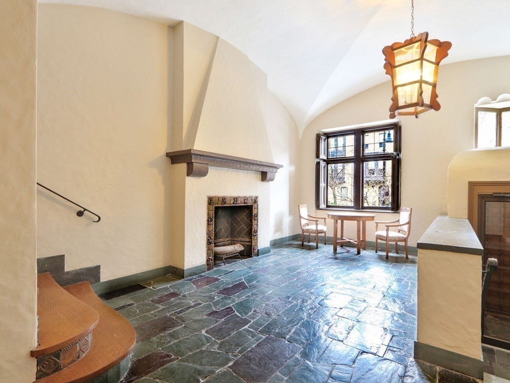 206 Beacon Street, Unit 1 Boston, MA 02116 - Photo 23 of 23 a living room with furniture and a fireplace