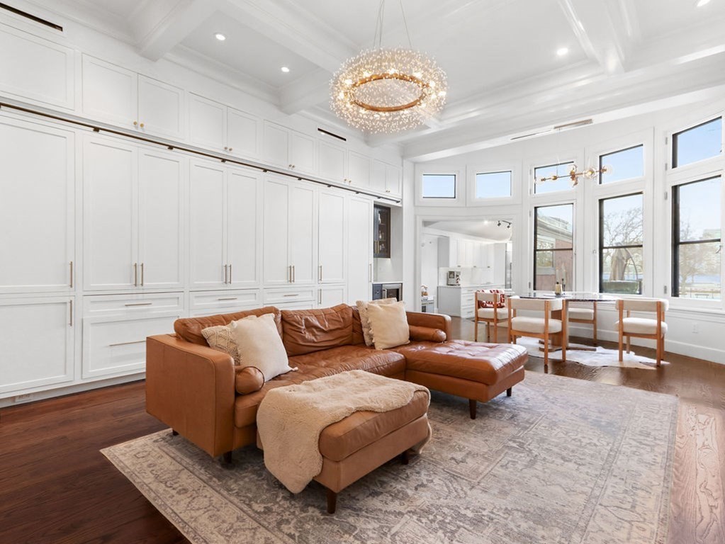 206 Beacon Street, Unit 1 Boston, MA 02116 - Photo 4 of 23 a living room with furniture and a large window