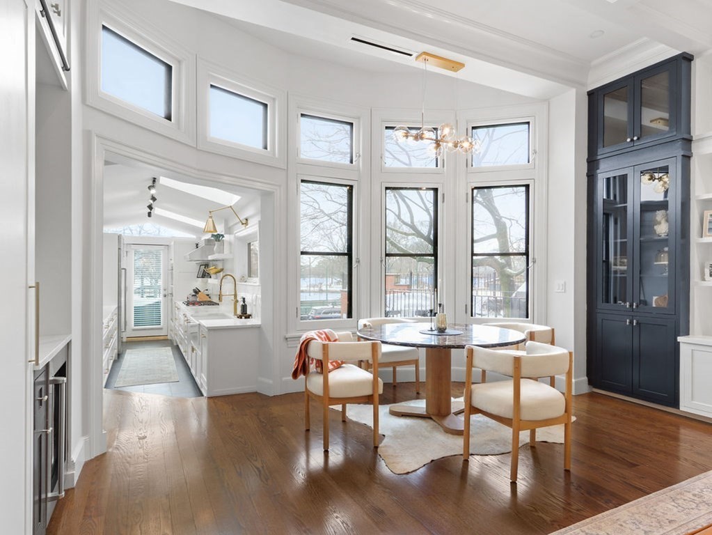 206 Beacon Street, Unit 1 Boston, MA 02116 - Photo 5 of 23 a view of a dining room with furniture and wooden floor