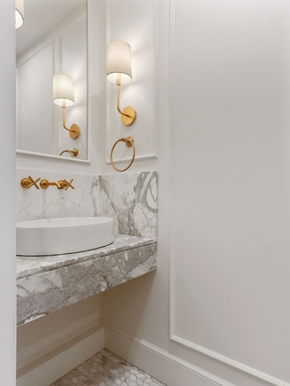 206 Beacon Street, Unit 1 Boston, MA 02116 - Photo 8 of 23 a bathroom with a sink and a mirror