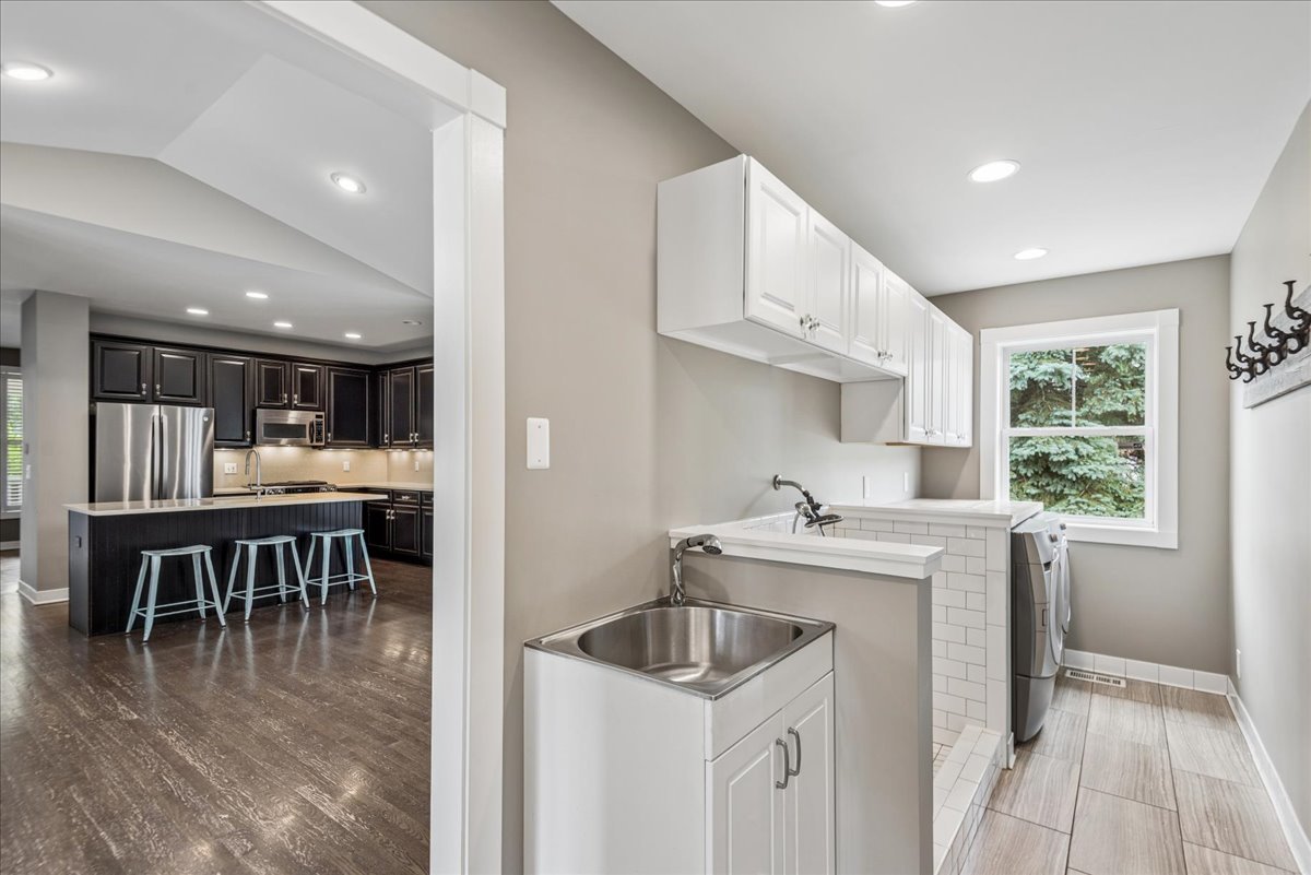 634 Indian Path Road Grayslake, IL 60030 - Photo 11 of 23 a kitchen with a sink a stove and cabinets