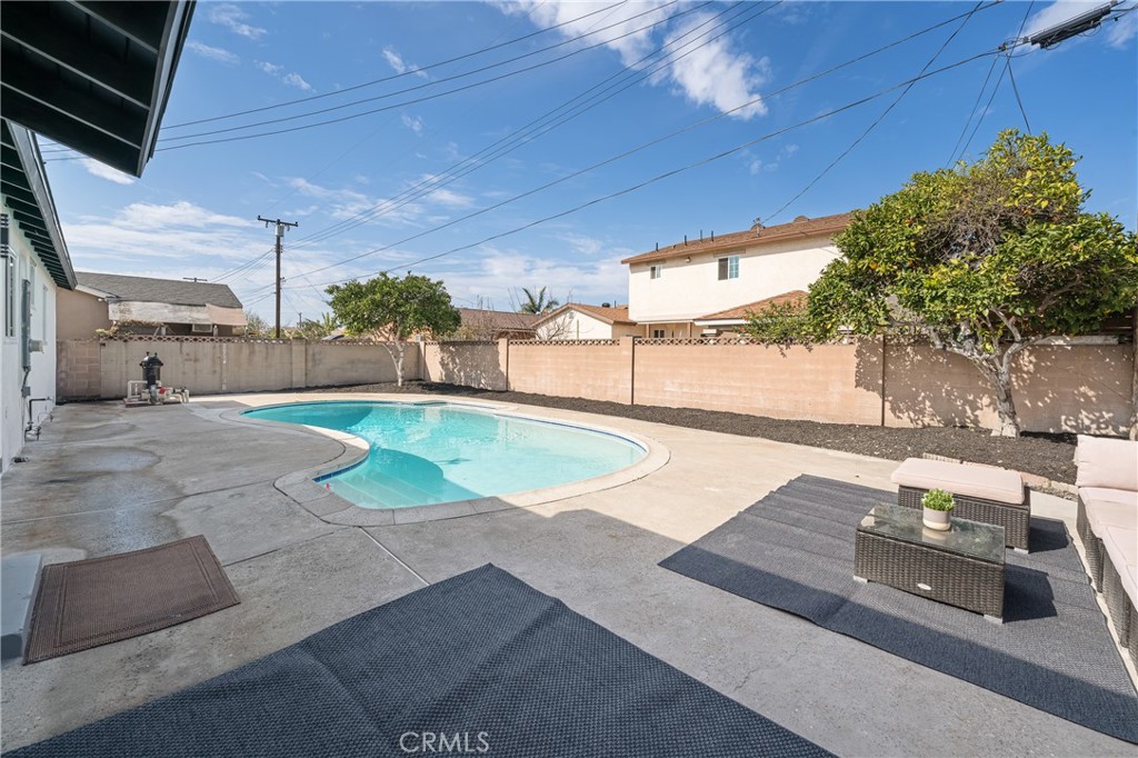 7201 Cerritos Avenue Stanton, CA 90680 - Photo 31 of 35 a view of a swimming pool with a patio