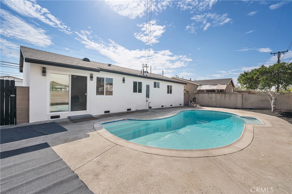 7201 Cerritos Avenue Stanton, CA 90680 - Photo 32 of 35 a view of a house with a backyard