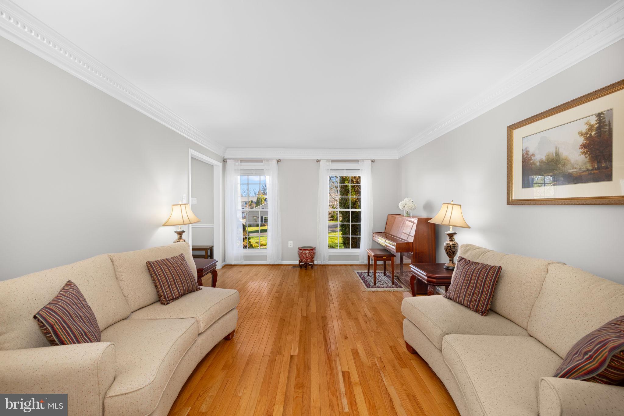 9451 Lapstrake Lane Burke, VA 22015 - Photo 19 of 59 a living room with furniture and a couch
