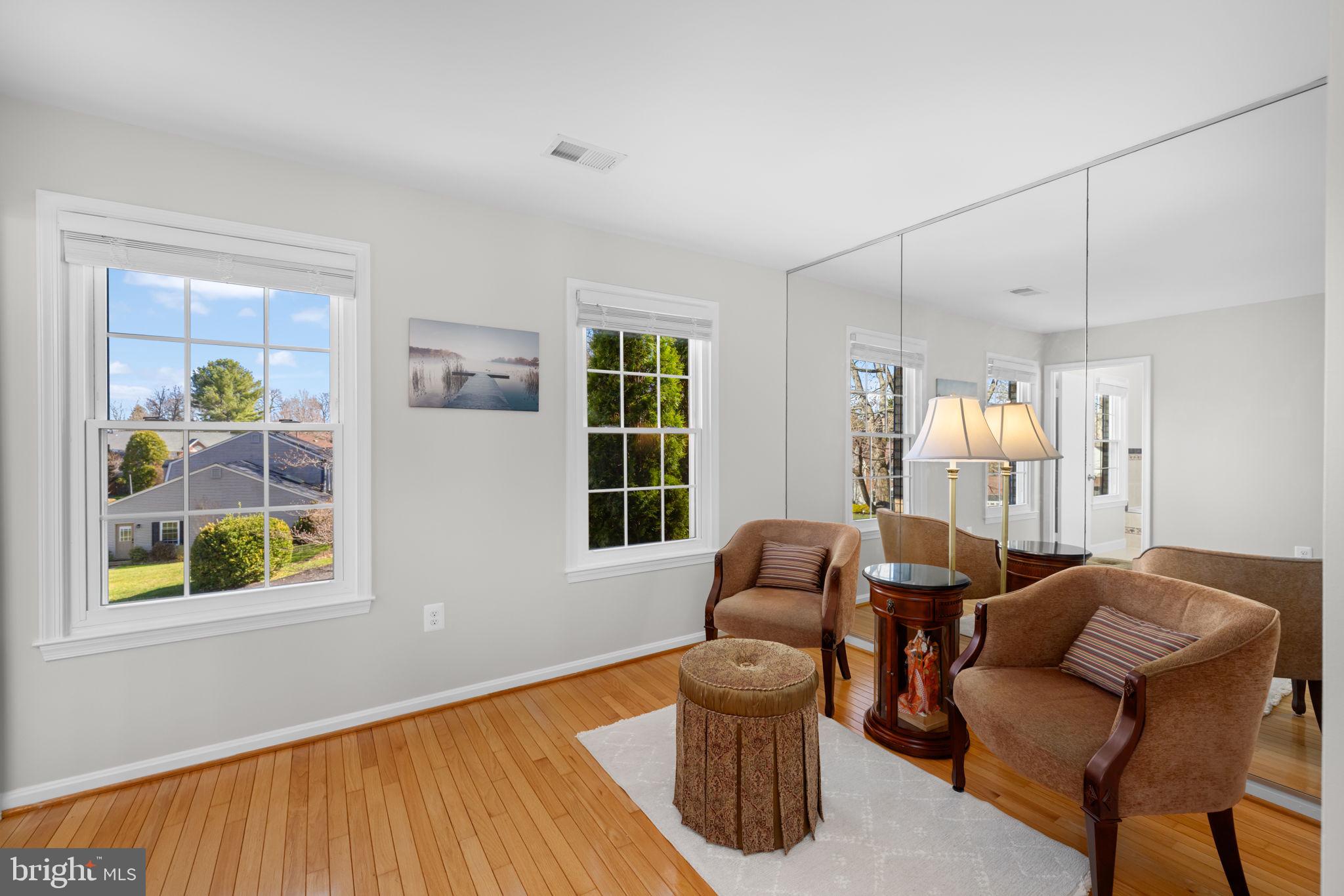 9451 Lapstrake Lane Burke, VA 22015 - Photo 28 of 59 a living room with furniture and a window