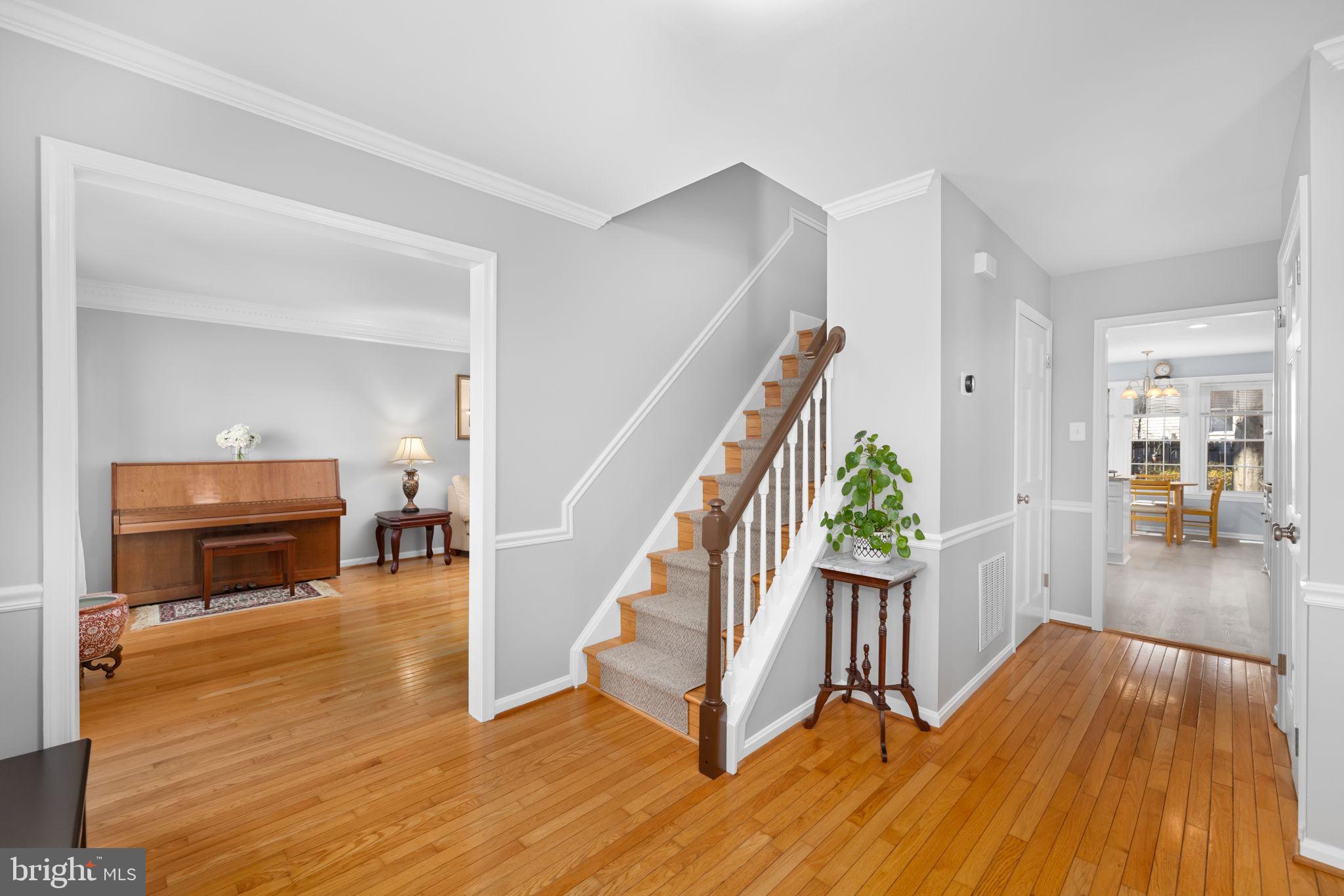 9451 Lapstrake Lane Burke, VA 22015 - Photo 3 of 59 a view of entryway and hall with wooden floor
